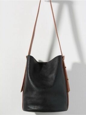 Anthropologie Black and Tan Leather Shoulder Bucket Bag